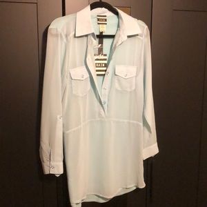 See-through light blue blouse